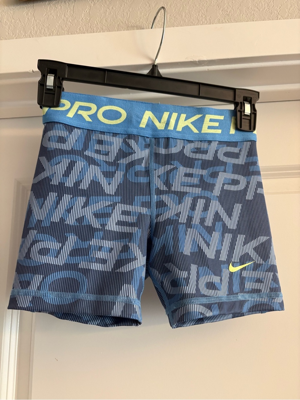 Nike Pro Blue Shorts with Yellow Logo